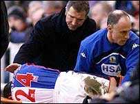Barry Ferguson goes off with a broken knee cap (c) BBCi Sport